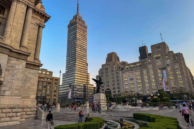 Mexico City at Night Walking tour with optional Torre Latino - Guides, group style, and pace