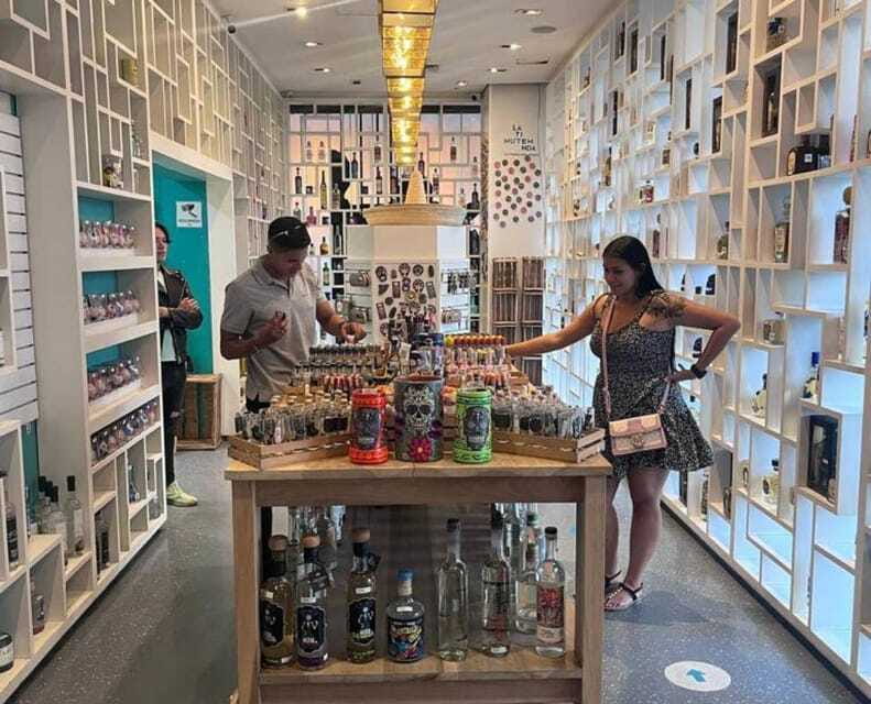 Mexico City: Tequila and Mezcal Museum Tour with Tasting - The bottle collection tells a second story