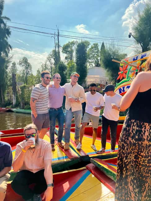 Mexico City: Xochimilco Boat with Guacamole & Premium Drinks - The colorful trajinera and the canal ride