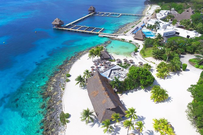 Official Chankanaab Park Day pass and Snorkel with Lunch included - Beach chairs, rocky water, and park time