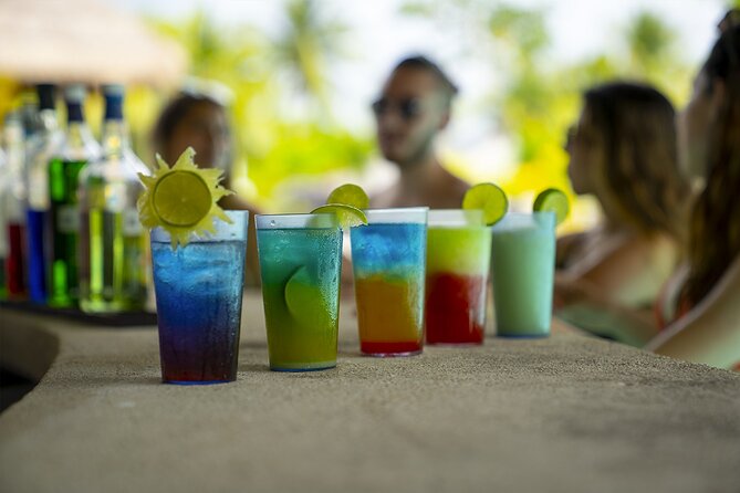 Playa Uvas Beach Club All-Inclusive Pass - Your first look: pools, shade, and a rocky shoreline