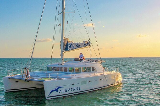 Plus Full Day Catamaran Tour to Isla Mujeres All Inclusive - Sailing with the national open bar