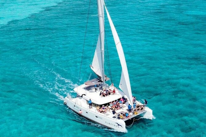 Plus Full Day Catamaran Tour to Isla Mujeres All Inclusive - Punta Sur, beach club, and the center of Isla Mujeres
