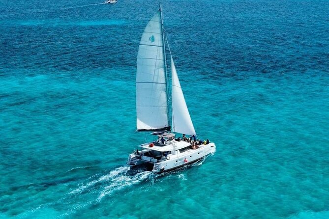 Plus Full Day Catamaran Tour to Isla Mujeres All Inclusive - Snorkeling near Isla Mujeres