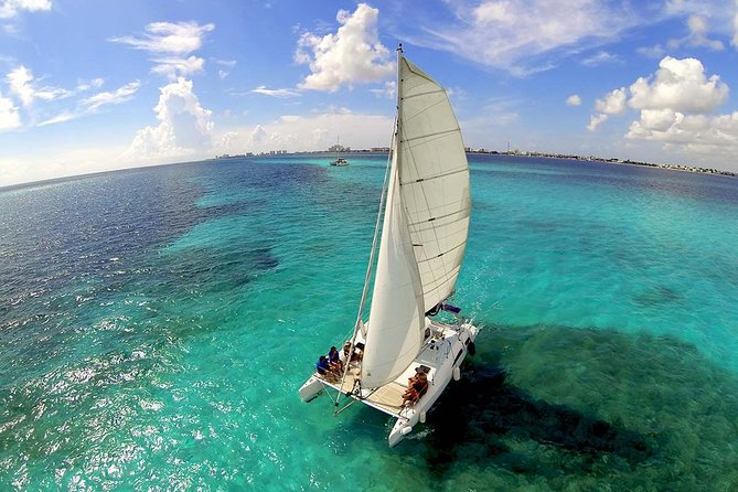 Private Catamaran from Cancun to Isla Mujeres for up to 13 People - Snorkeling the reef with Fernando, Willy, or another guide