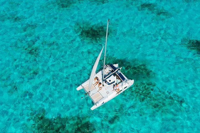 Private Catamaran from Cancun to Isla Mujeres for up to 13 People - Open bar, lunch, and the real cost