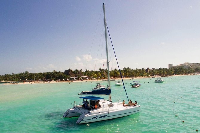 Private Catamaran from Cancun to Isla Mujeres | For up to 25 ppl - Drinks, food, and the true price