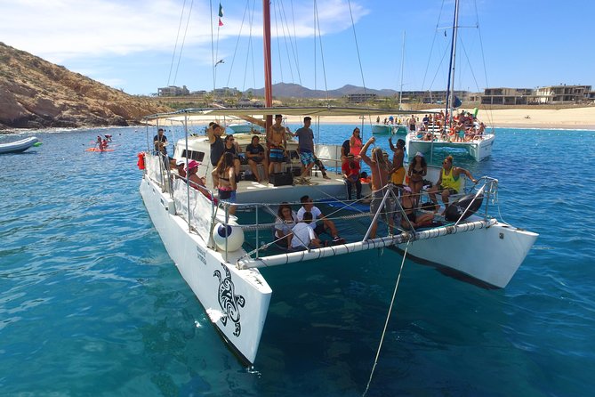 Private Catamaran Snorkeling Cruise in Los Cabos - Open bar, snacks, and the service onboard