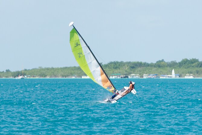 Private Eco-Tour on a Recreational Catamaran with Kayaks Included - Booking, weather, and cancellation details