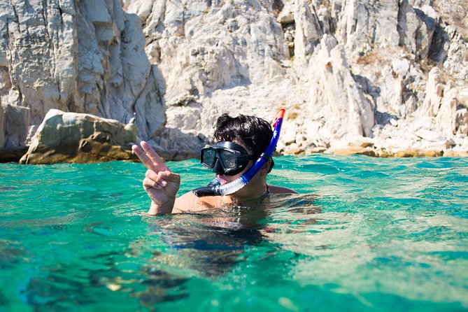 Private Los Cabos Arch and Playa del Amor Tour by Glass Bottom Kayak - The early paddle past Pelican Rock