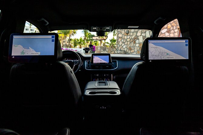 Private SUV Round-Trip from Airport to Hotels in the Corridor - Water, beer, and the small details