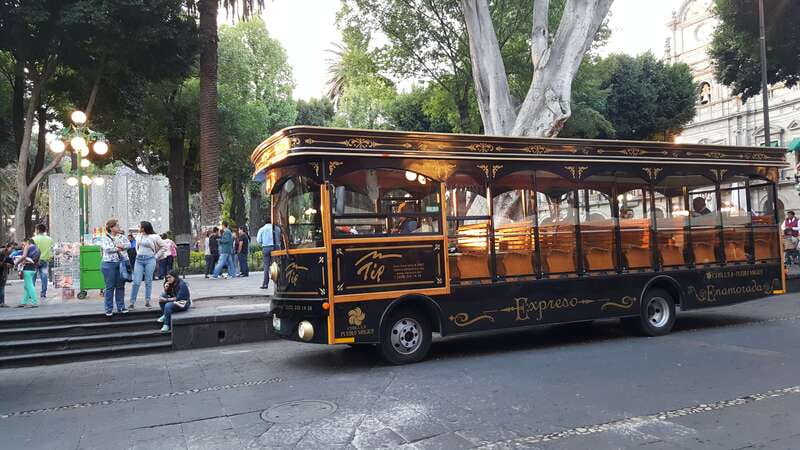 Puebla: Cholula Magical Town Tour by Double-Decker Bus - The route back through local sights