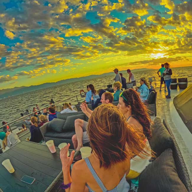 Puerto Vallarta: Mega Yacht Whale Watching Sunset Cruise - Sunset over the bay