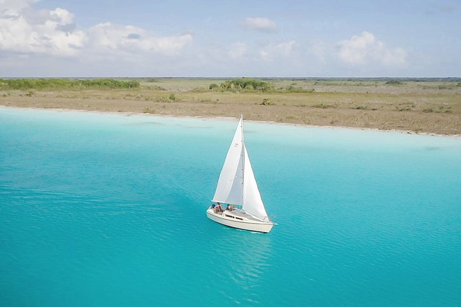 Sailing Tour through the Lagoon of the 7 Colors - Bacalar Lagoon from the deck of a sailboat