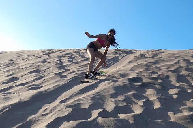 Sandboarding in the Mogote Dunes in Mexico - Your first lesson starts on the gentle slopes