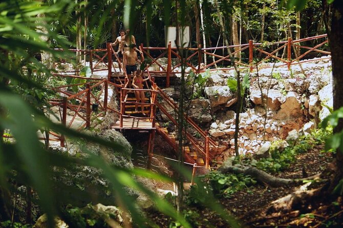 Small-Group 3 Hidden Cenotes Adventure with Tequila Tasting - The lively finish, fire dancers, and waiting time
