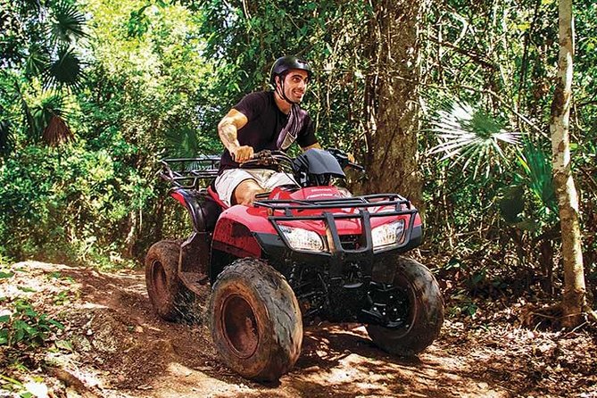 Snorkel, ATV, Zipline and Cenote Adventure from Cancun - Swimming in the limestone cenote