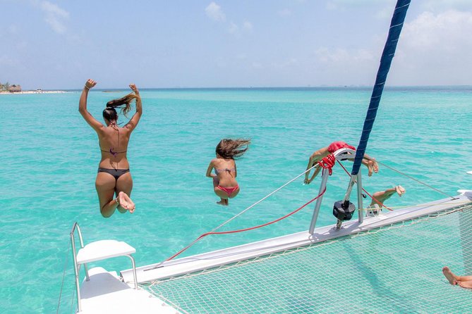 Snorkeling Adventure at Isla Mujeres Includes Lunch and Open Bar - Lunch, drinks, and beach-club time