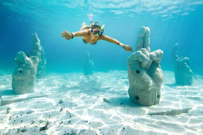 Snorkeling in Isla Mujeres and Underwater Museum - The $59.74 price is good if the conditions cooperate