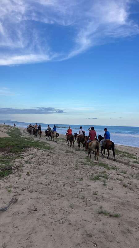 Sunset by Horse on the Beach - Riding toward the Pacific at sunset