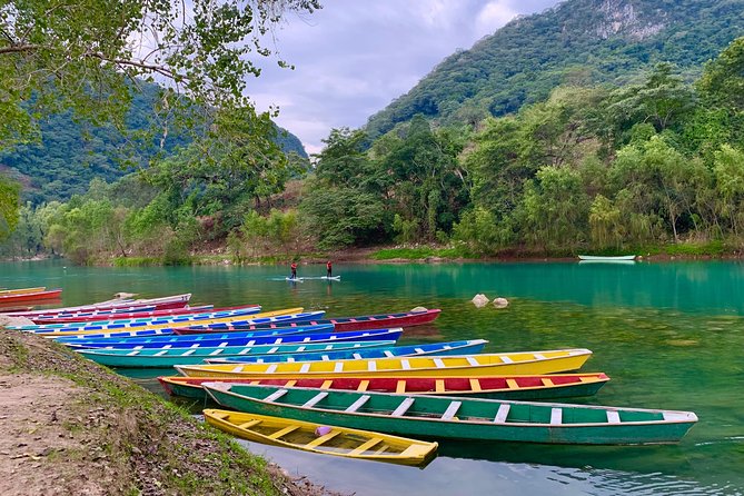 Tamul waterfall and water cave on a wooden canoe - Why the Tampaon River makes this more than a waterfall trip
