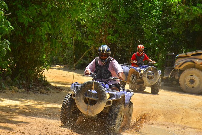 Top ATV's in Mexico includes Cenote, Ziplines, snack & transport. - Flying through the treetops on the zipline circuit