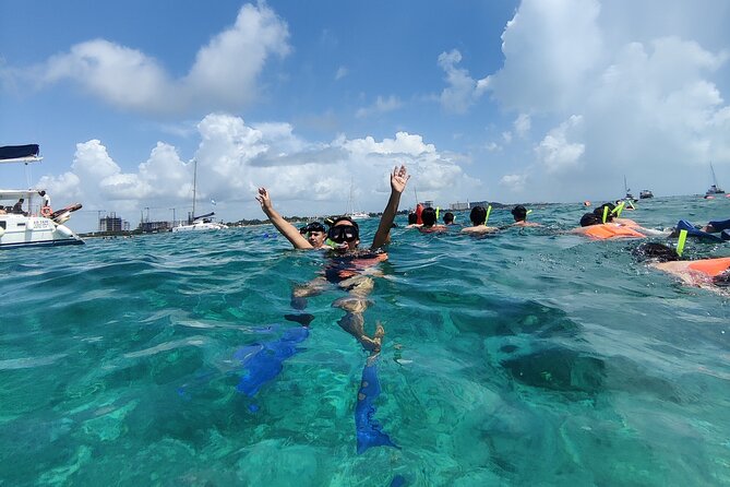 Top Isla Mujeres Catamaran Tour with Snorkel Open Bar and Buffet lunch - Setting sail from Cancun