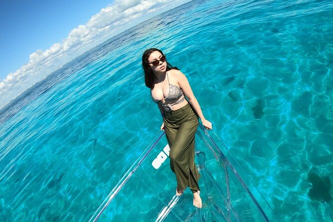 Tour Isla Mujeres excursion in Collective Transparent Boat - El Farito and colorful fish
