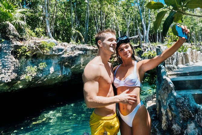 Tulum Day Trip Mayan Ruins and Cenote Swim - Cooling off at Cenote Puerta Maya