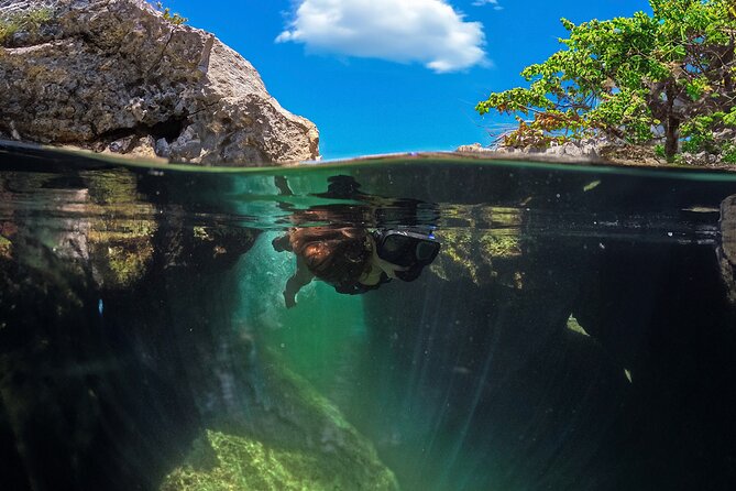 Tulum Guided Tour, Magical Cenote, Lagoon Snorkeling and Beachside Lunch - Tulum ruins and the view over the Caribbean