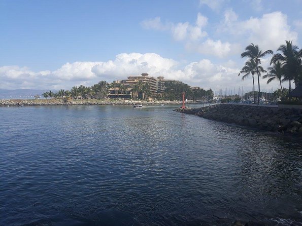 Whale Watching Cruise In Puerto Vallarta & Nuevo Vallarta - The catamaran, seating, and view from the water