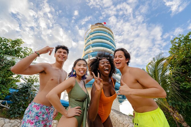 Xel-Ha Tickets with Transportation included - The lighthouse, cliff jumps, and paid thrills